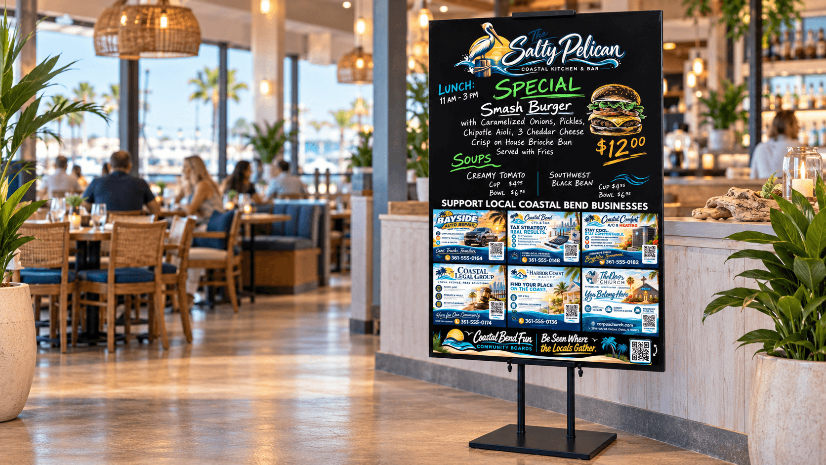 Coastal Bend Fun Community Board on its stand inside a bright coastal restaurant, with a demo Host header, specials area and 6 Featured Business Positions