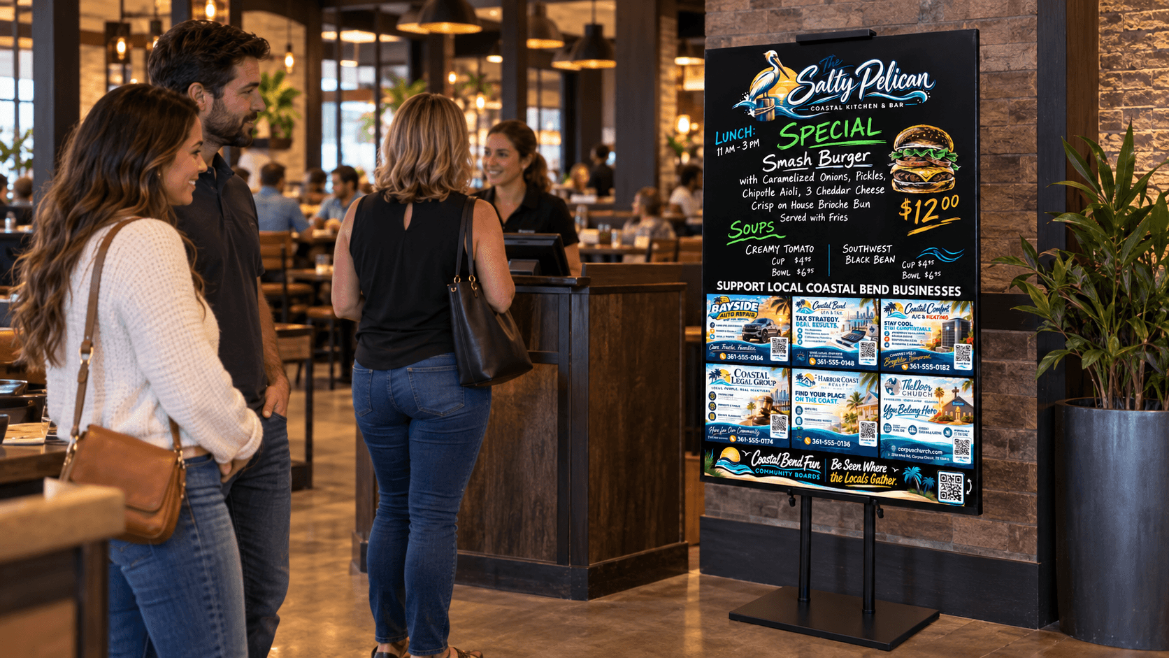 Guests near a restaurant host stand with the customized Coastal Bend Fun Community Board displayed against a textured wall